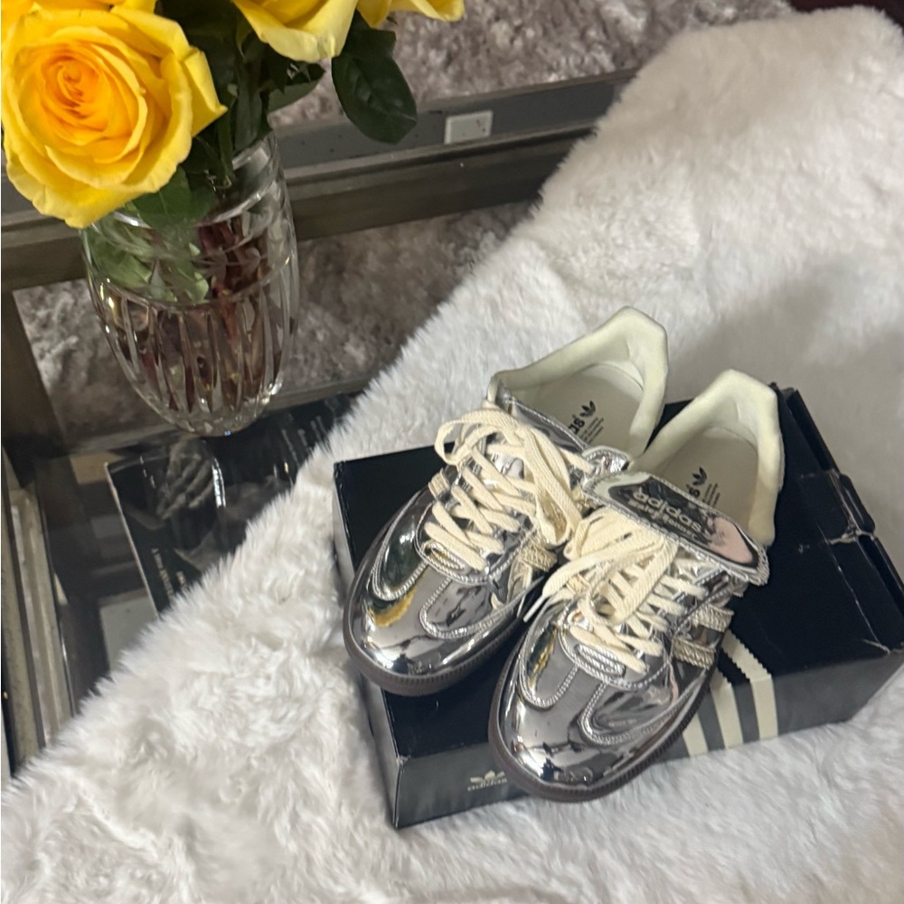 Adidas Women's Silver Sneakers screaming attention. Fly for real